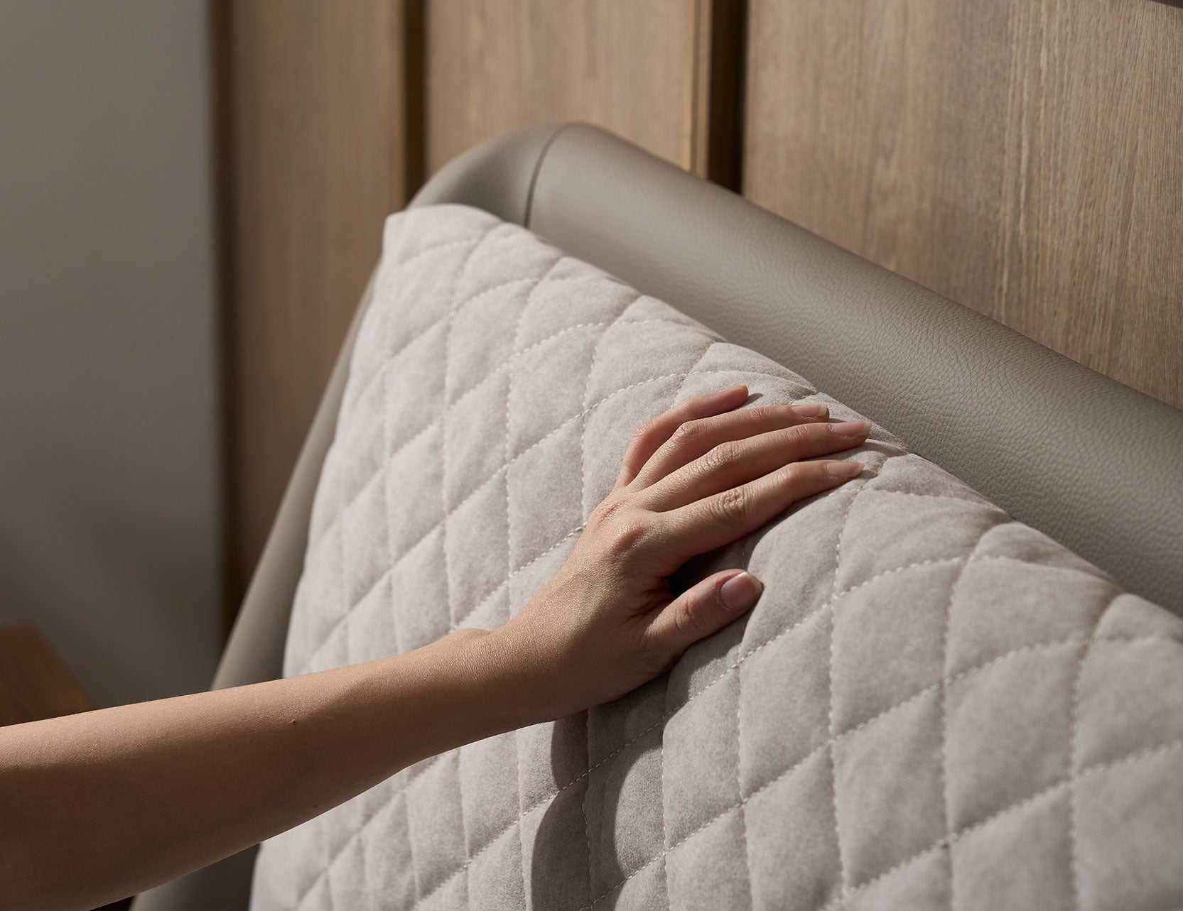 Slanted bed frame with cushioned headboard support