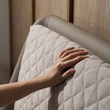 Slanted bed frame with cushioned headboard support