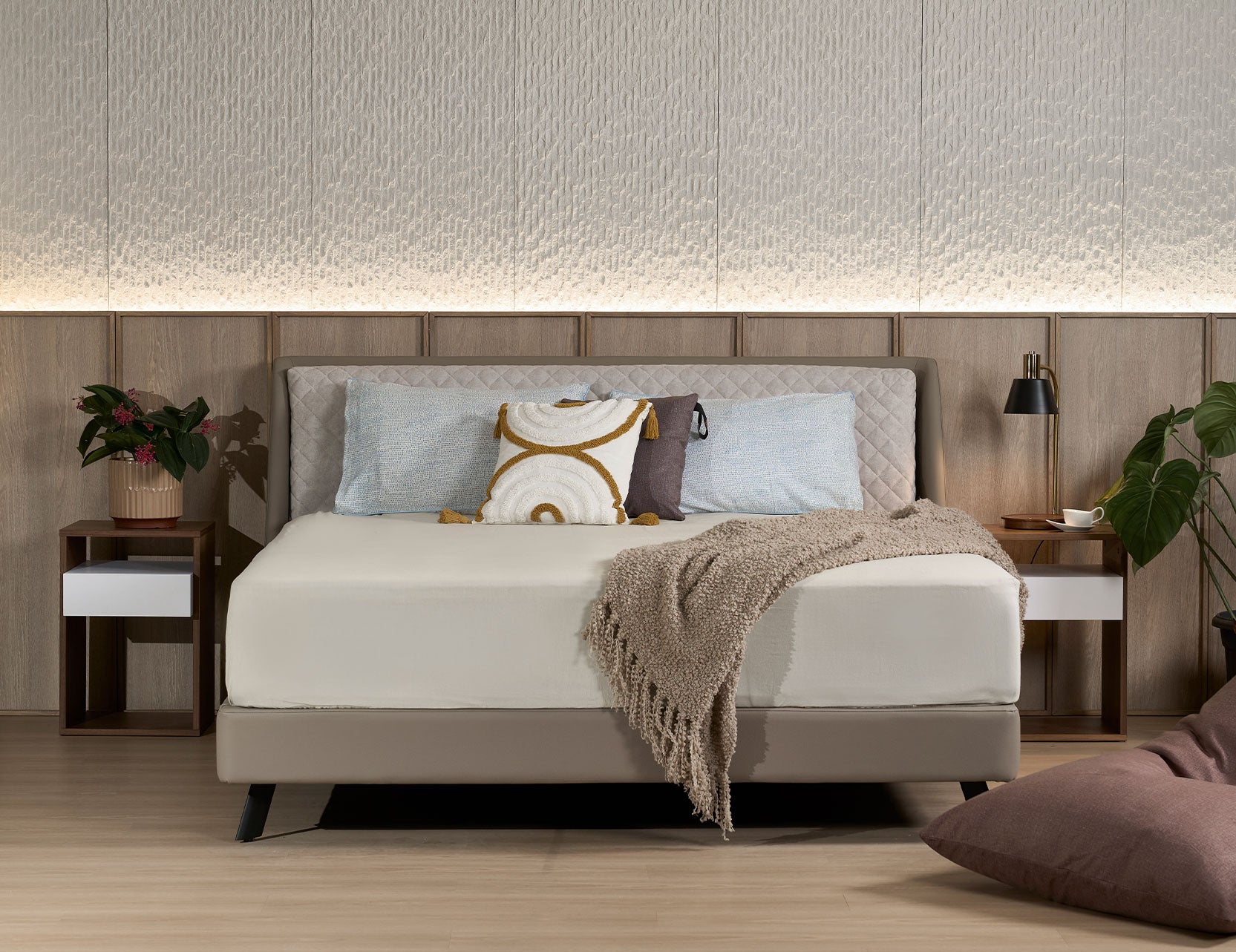 Slanted bed frame paired with mattress in a bedroom setting