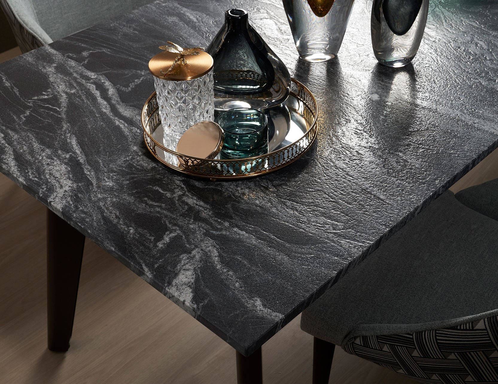 Black Beauty dining table close up showing surface detail