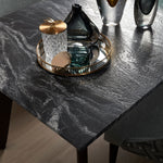 Black Beauty dining table close up showing surface detail