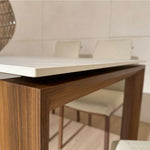 Carment dining set shown from an angled perspective