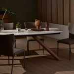 Branca foil dining table styled with dining chairs