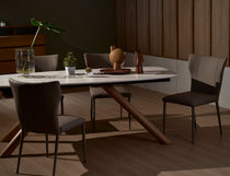 Branca foil dining table styled with dining chairs