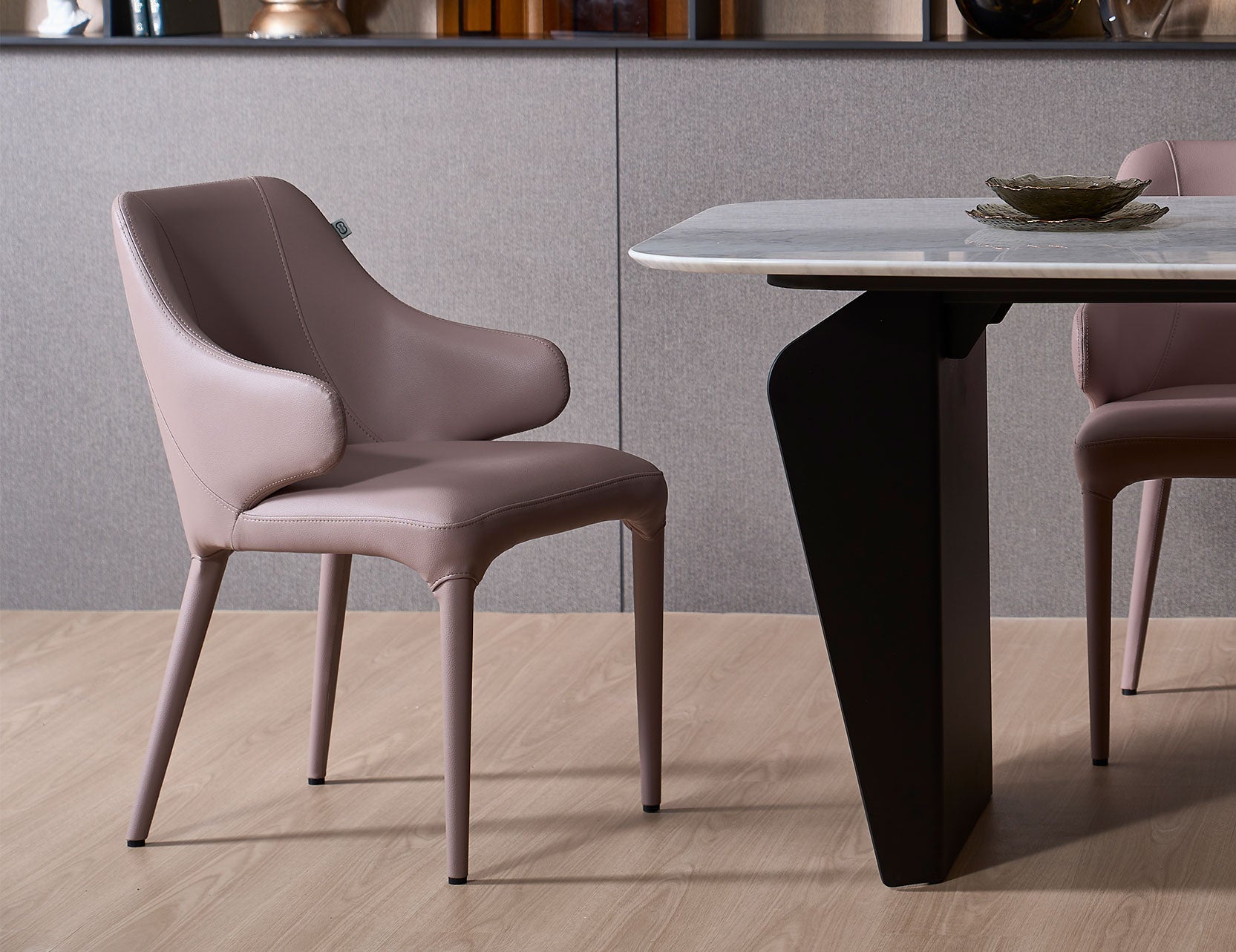 Hugg dining chair featuring a soft rounded backrest