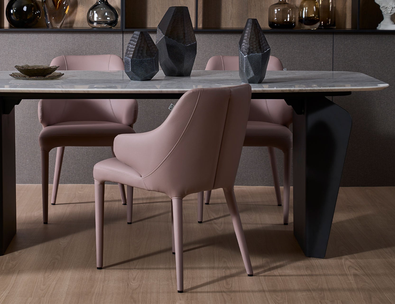 Hugg dining chair back view highlighting its curved form