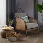 Nash rattan armchair with a natural textured finish