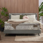 Natura bed frame styled in a calm bedroom setting