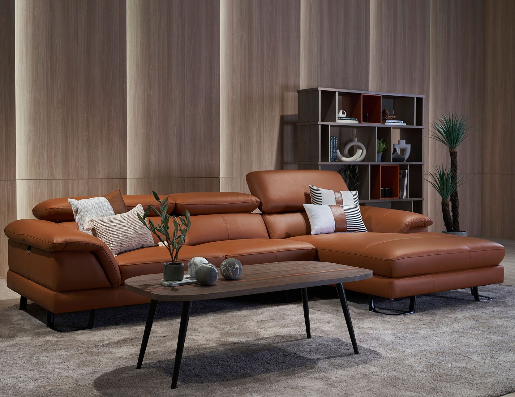 Korus leather sofa paired with wing chair in living room
