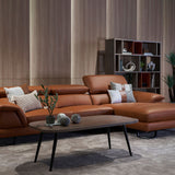 Korus leather sofa paired with wing chair in living room