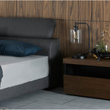 Slide bedside table styled in a modern bedroom