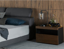 Slide bedside table styled in a modern bedroom