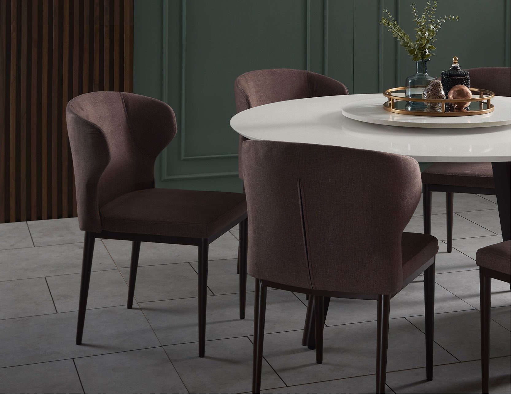 Wing dining chair featuring a bold sculptural design