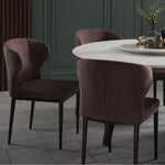 Wing dining chair featuring a bold sculptural design