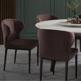Wing dining chair featuring a bold sculptural design