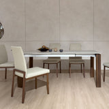 Carment dining set featuring coordinated table and chairs