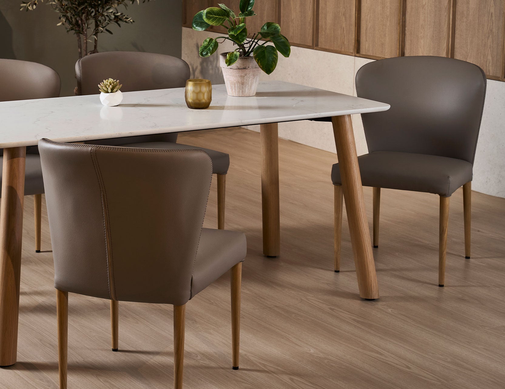 Anna leather dining chair with a refined upholstered finish