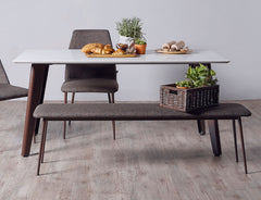 Henry dining bench featuring a refined contemporary profile