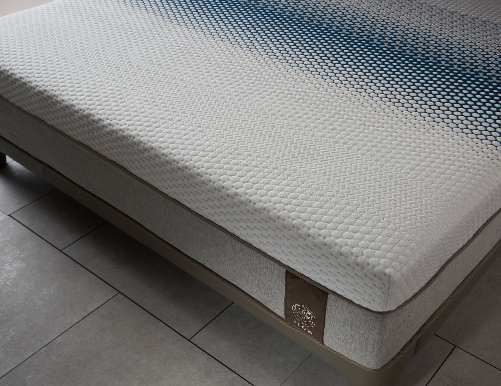 Flow mattress shown in a clean bedroom layout