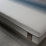 Flow mattress shown in a clean bedroom layout
