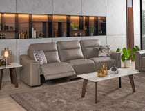 Grande three seater sofa styled in a contemporary living space