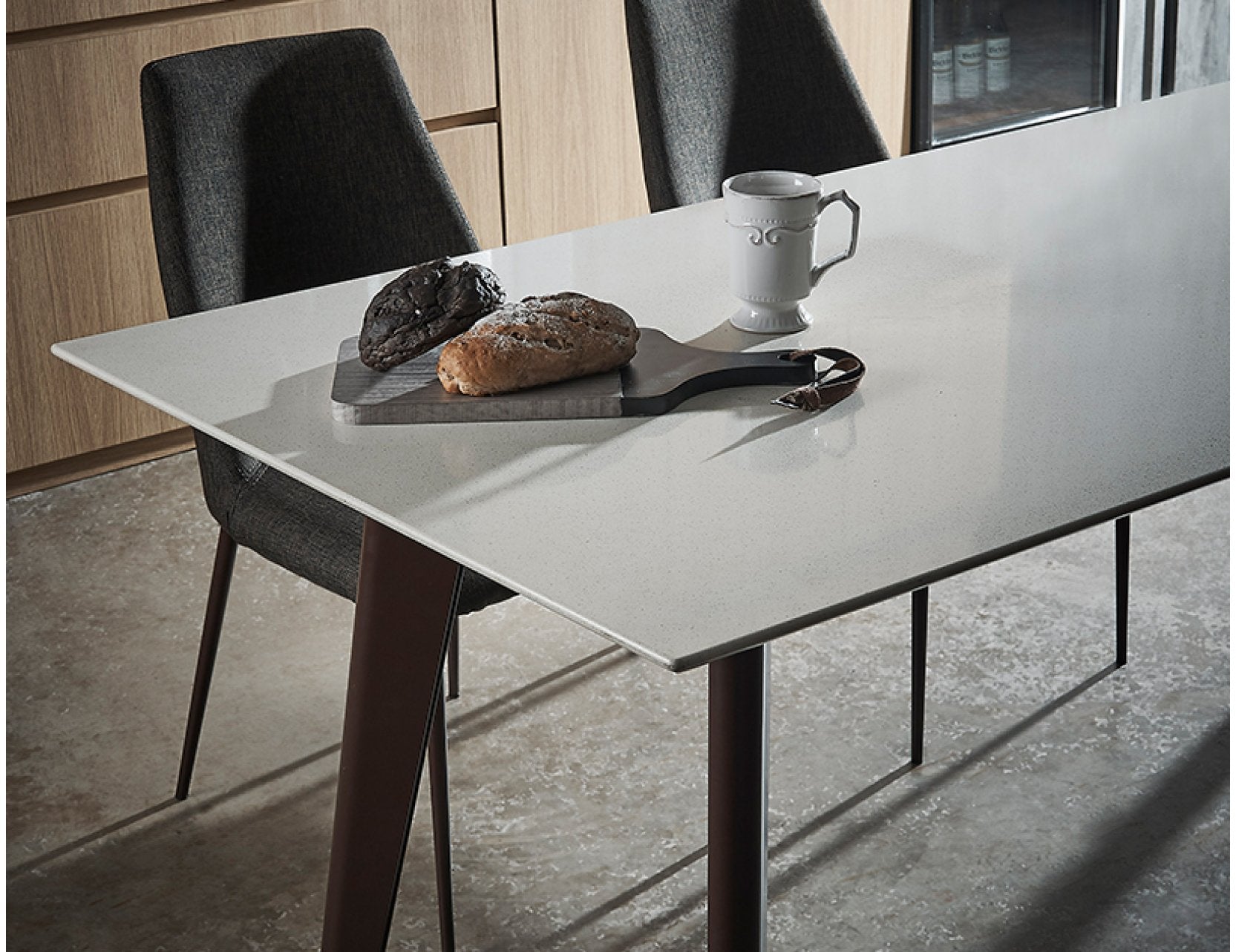 Kay quartz dining table with a clean modern profile