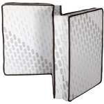 Trifold floor mattress shown in a compact fold
