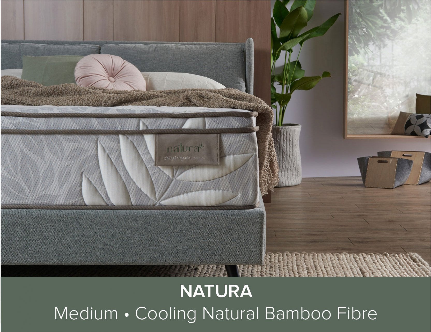 Natura mattress branding displayed on bed