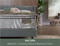 Natura mattress branding displayed on bed