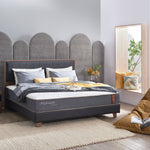 Orthopedic mattress displayed on a supportive bed base