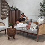 Nash fabric two seater sofa shown with model for scale