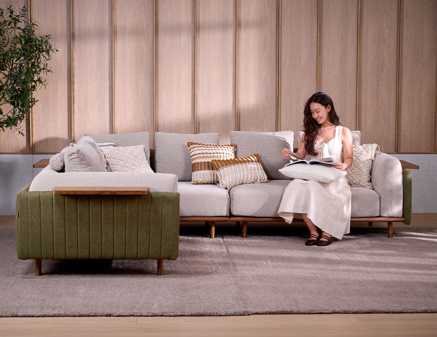 Celadon fabric L shape modular sofa styled in a living room