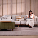 Celadon fabric L shape modular sofa styled in a living room