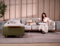 Celadon fabric L shape modular sofa styled in a living room