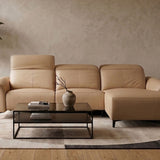 FELIX Leather Motorised Modular Sofa in leather, featuring adjustable headrests and a right-facing chaise, styled in a modern living room setting.