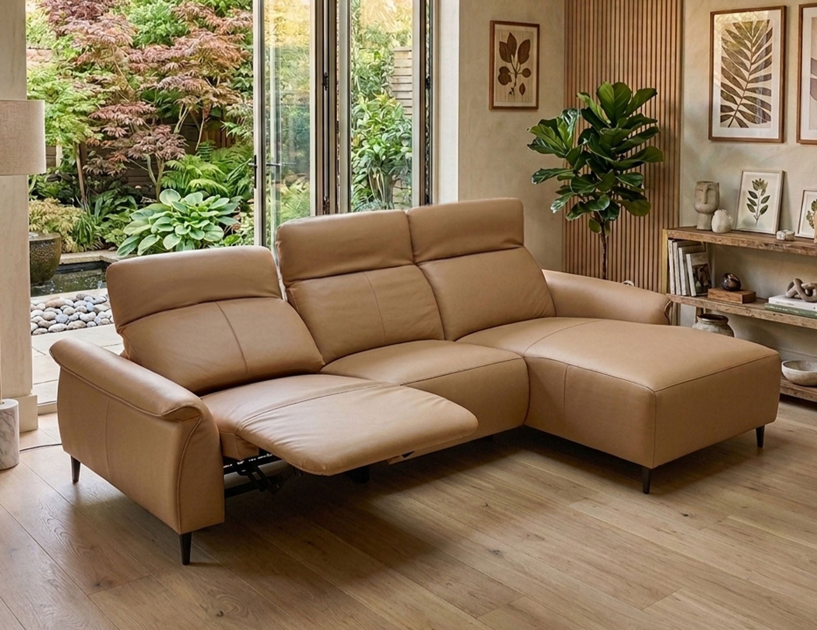 FELIX Leather Motorised Modular Sofa from top left down view in leather, featuring adjustable headrests and a right-facing chaise, styled in a modern living room setting.

