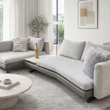 Modern L shape fabric sofa with curved design in bright living room