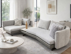 Modern L shape fabric sofa with curved design in bright living room