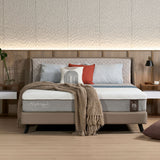 Slanted bed frame styled in a bedroom setting
